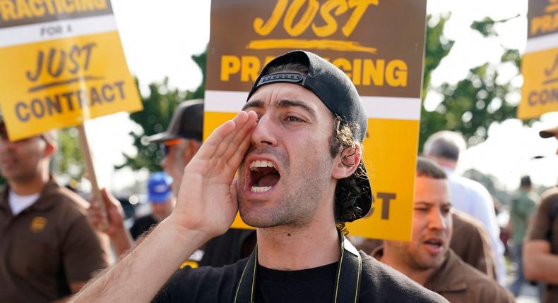 UPS workers walked a 'practice picket line' on July 7, 2023, in the Queens borough of New York City, ahead of a possible UPS strike.Timothy A. Clary/AFP via Getty Images