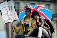 Demonstrators take part in a protest aimed at showing London's solidarity with the European Union fo