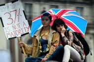 Demonstrators take part in a protest aimed at showing London's solidarity with the European Union fo