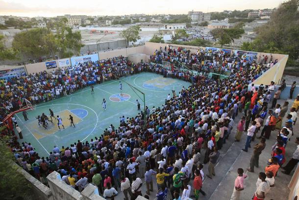 Basketball fans gather at Lujino stadium as they watch the final between Hegan and Horseed in Mogadi
