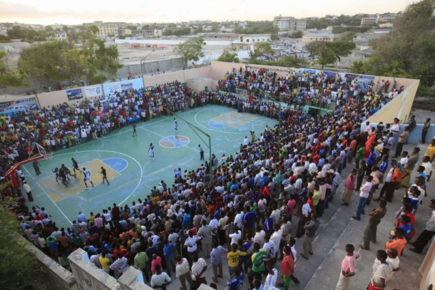 Basketball fans gather at Lujino stadium as they watch the final between Hegan and Horseed in Mogadi