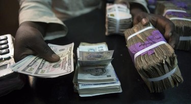 Naira rises slightly to gain 0.39% against dollar at official rate