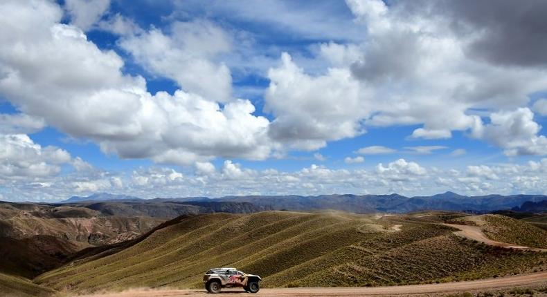 Reigning Dakar auto champion Stephane Peterhansel crashed into Slovenian motorbike rider Simon Marcic during the Dakar's tenth stage