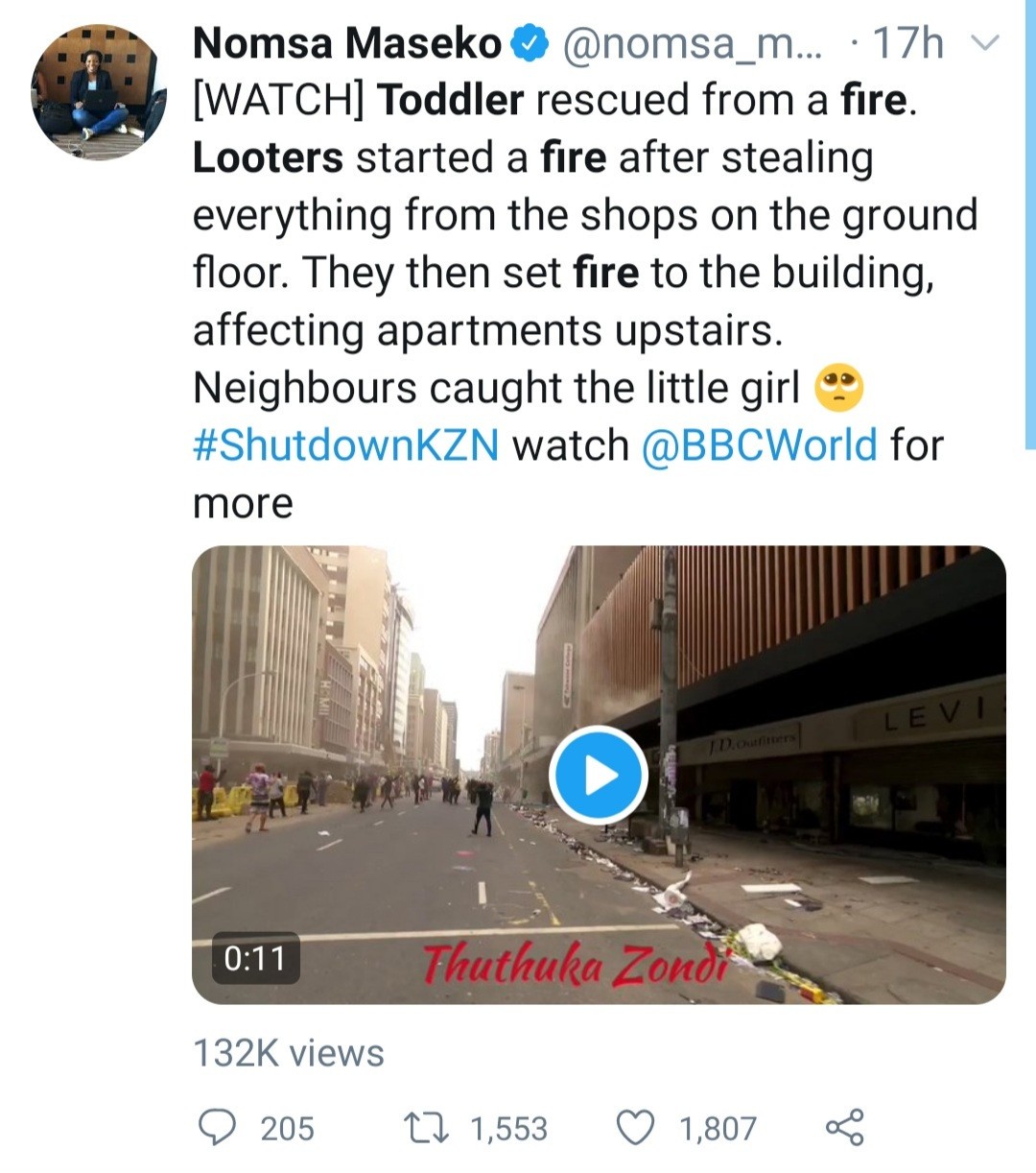 Heart-stopping moment a baby is thrown from burning story building in South Africa