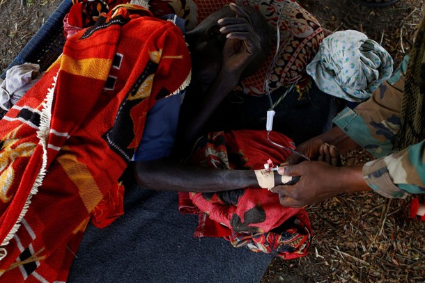 The Wider Image: Mother reunited with children after five-year search