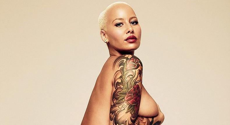 Amber Rose has stripped off naked in a striking image to co-incide with a new interview in GQ magazine, in which she seemed to reignite her feud with the Kardashian-Jenners