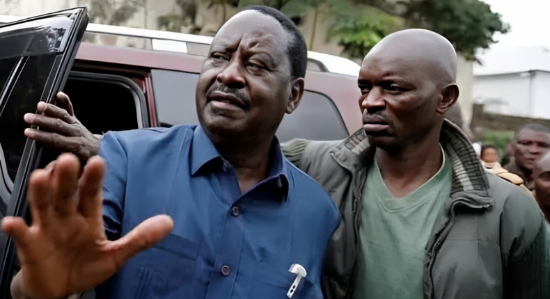 File image of former Prime Minister Raila Odinga and his bodyguard, Maurice Ogeta