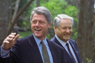 Vancouver, Canada. Russian President Boris Yeltsin (R) and U.S. President Bill Clinton on a walk in 