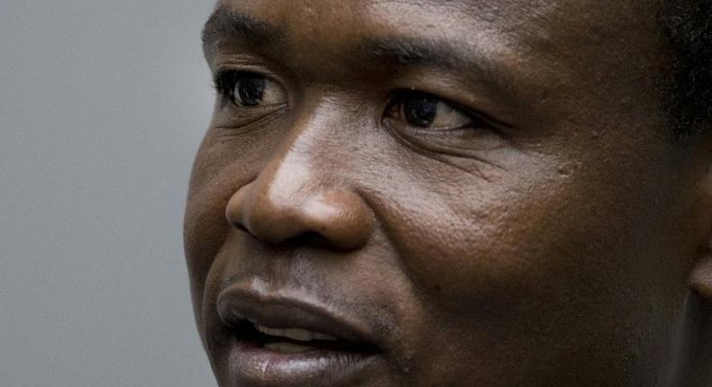 Dominic Ongwen sits in a courtroom at the International Criminal Court in the Hague on December 6, 2016