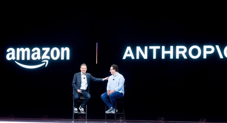 Amazon Web Services CEO Adam Selipsky speaks with Anthropic CEO Dario Amodei during a 2023 conference.Noah Berger/Getty