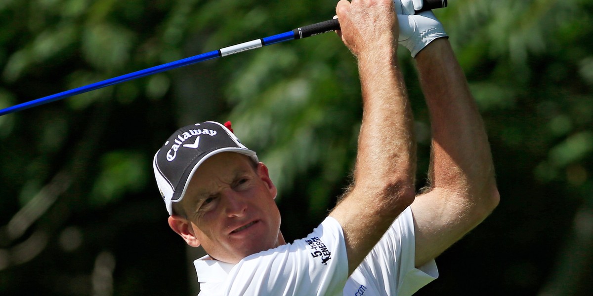 Jim Furyk of the United States plays his shot from the 12th tee during the first round of the travelers Championship at TPC River Highlands on August 4, 2016 in Cromwell, Connecticut.