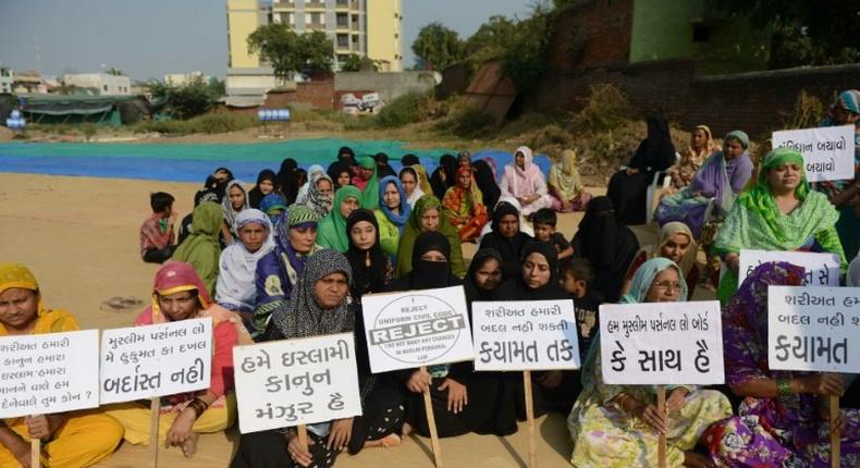 Indian Muslim women participate in a rally to oppose the Uniform Civil Code that would outlaw the practice of triple talaq in Ahmedabad in 2026