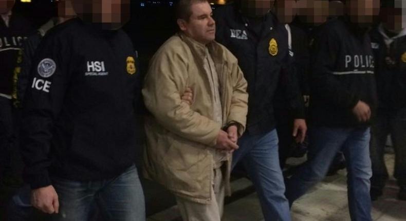 Joaquin Guzman aka El Chapo is escorted by Immigration and Customs Enforcement personal as he is extradited to the United States on January 19, 2017, in Ciudad Juarez, Mexico