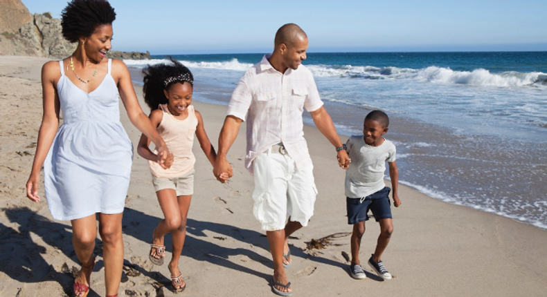 Black family on the beach (Jumia Travel)