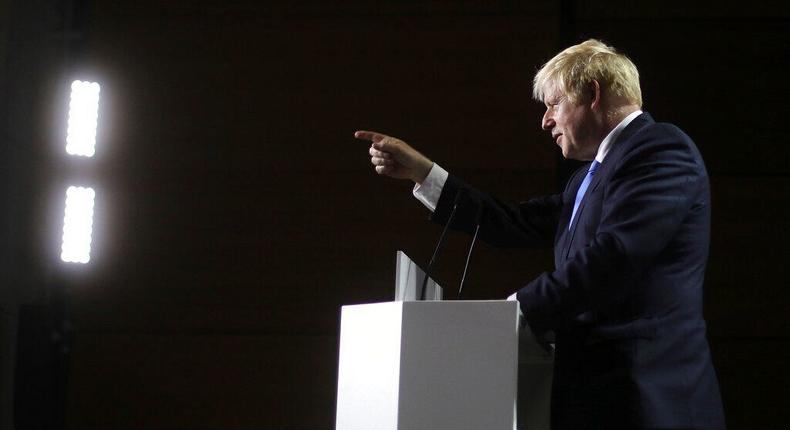 British Prime Minister Boris Johnson gestures as he speaks during a press conference on the third and final day of the G7 summit in Biarritz, on August 26, 2019.