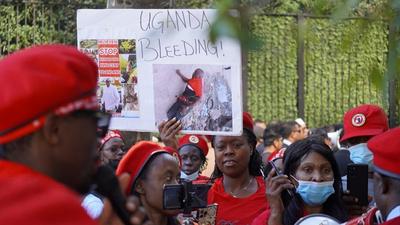 Ugandan protestors outside the UN 