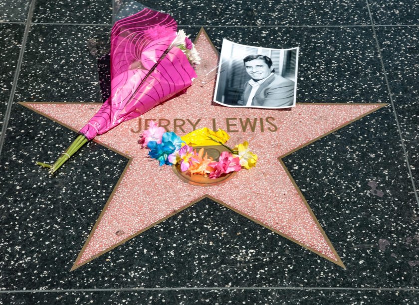 FILE PHOTO: Jerry Lewis holds the Jean Hersholt Humanitarian Award during the 81st Academy Awards in