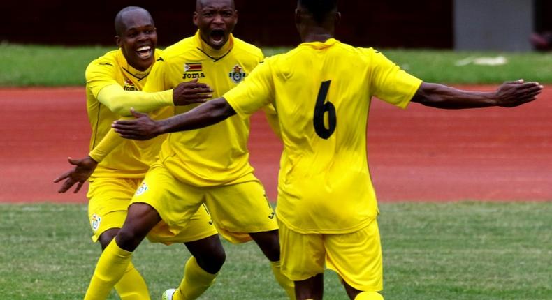 Kaizer Chiefs highly paid star Khama Billiat (C) celebrates a goal with Zimbabwe team-mates