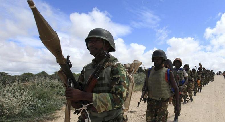 African Union Mission in Somalia (AMISOM) peacekeepers from Burundi patrol after fighting between insurgents and government soldiers erupted on the outskirts of Mogadishu in this May 22, 2012 file photo. 