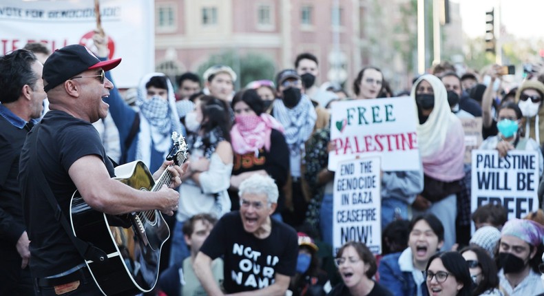 Musician Tom Morello performs at a pro-Palestinian rally in front of the University of Southern California.Mario Tama/Getty