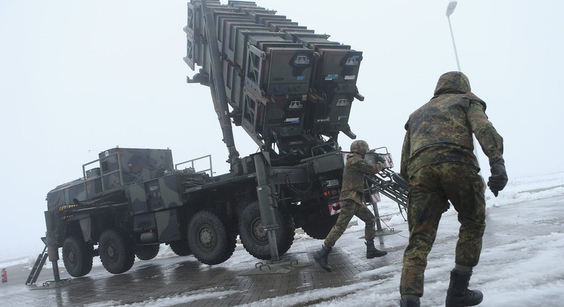 Members of the German Bundeswehr prepare a Patriot missile launching system in December 2012.Sean Gallup/Getty Images