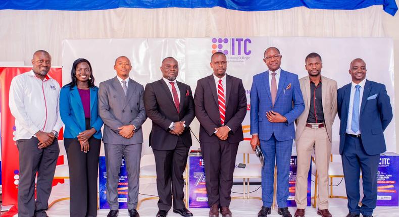 Minister Balaam Barugahara poses with other speakers at the John Ssebana Kizito Memorial lecture