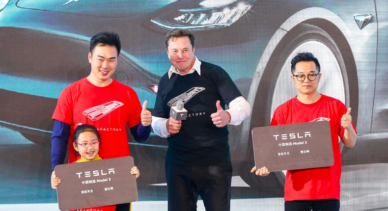 Tesla CEO Elon Musk praised the work ethic in China, and said the US needs to forget infighting to compete.