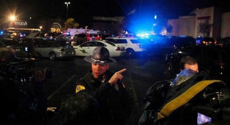 Washington State Trooper Mark Francis speaks to the media at the Cascade Mall following reports of an active shooter in Burlington, Washington. 