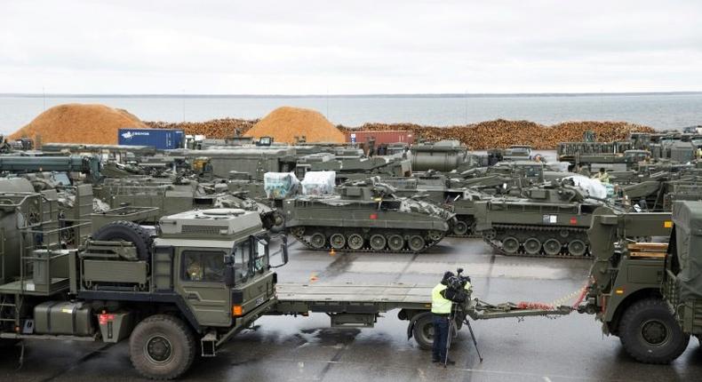 British tanks and military vehicles are unloaded at the port Estonian of Paldiski on March 22, 2017