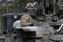 A soldier of the U.S. Army 2nd Cavalry Regiment deployed in Estonia, as a part of the U.S. military's Operation Atlantic Resolve, looks on during the "Dragoon Ride" exercise near Liepupe