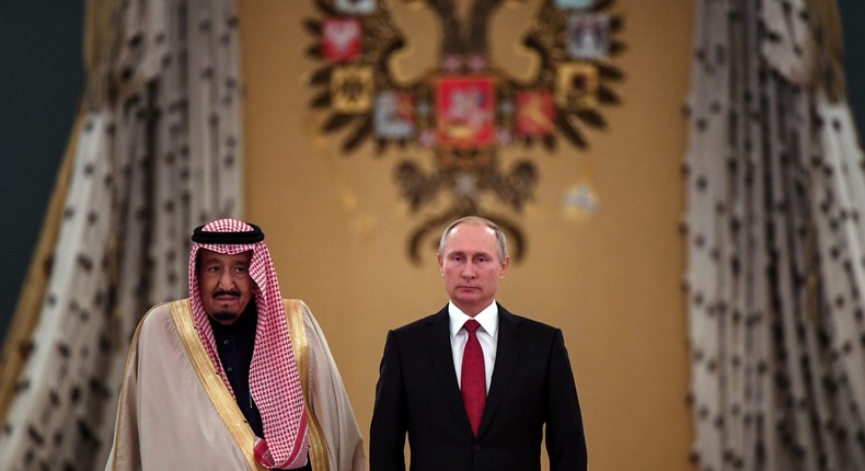 Russian President Vladimir Putin, right, and Saudi Arabia's King Salman pose for a photo during a welcoming ceremony ahead of their talks at the Kremlin in Moscow, Russia, on Thursday, Oct. 5, 2017.Yuri Kadobnov/Pool Photo via AP