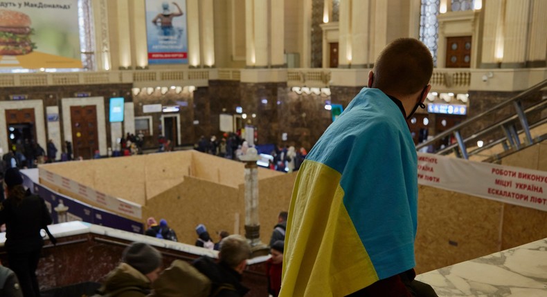 People wait for trains at a train station as they attempt to evacuate the city on February 24, 2022 in Kyiv, Ukraine.