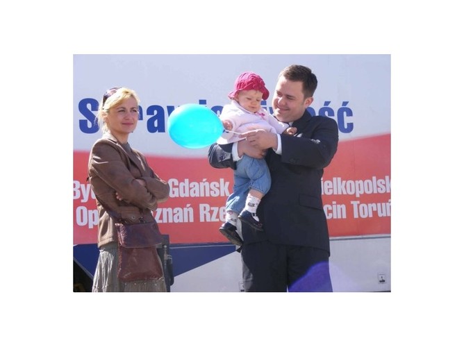 Adam Hofman z małżonką Joanną i córką Marysią