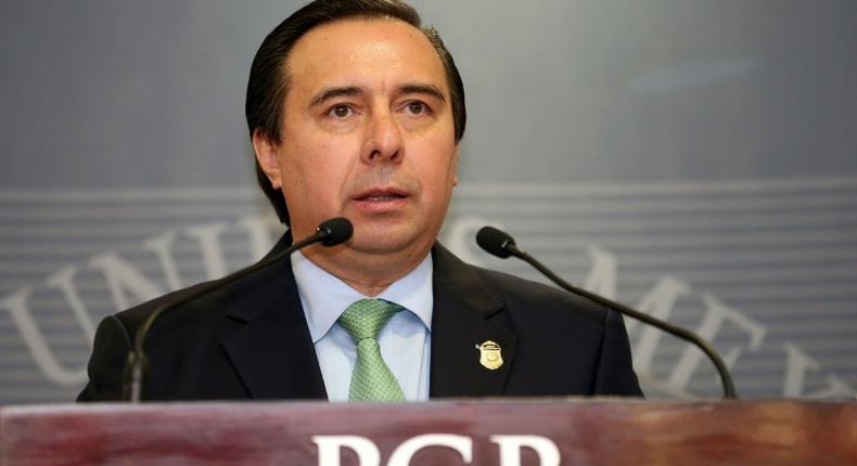 Tomas Zeron (pictured in a September 2015 handout photo), who was head of Mexico's Criminal Investigation Agency, is wanted over allegations of serious irregularities in the probe into one of the country's worst human rights tragedies