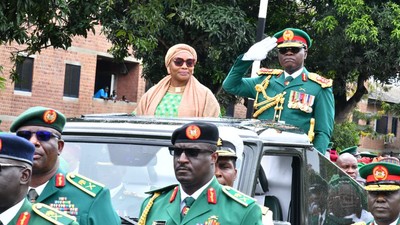 Former Chief of Army Staff, Lt.-Gen. Faruk Yahaya and his wife,  Salamatu  during the Pulling Out Parade in their honour in Abuja on Saturday (24/6/23).