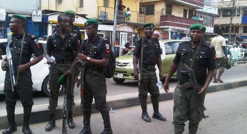 The policemen whose identities were not disclosed had demanded for a payment of N20,000 to attend to the robbery case. (Image of policemen used for illustrative purpose) [Punch]