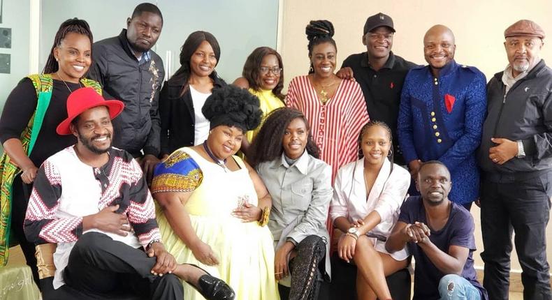 The cast of Papa Shirandula celebrating the death anniversary of Charles Bukeko