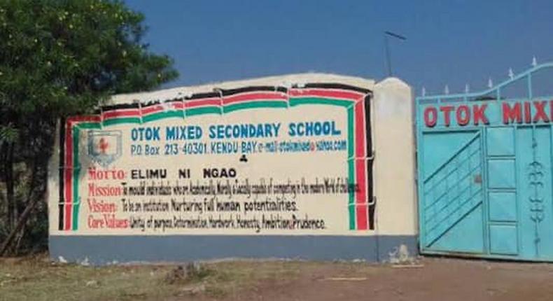 Image of Otok Secondary School main gate.