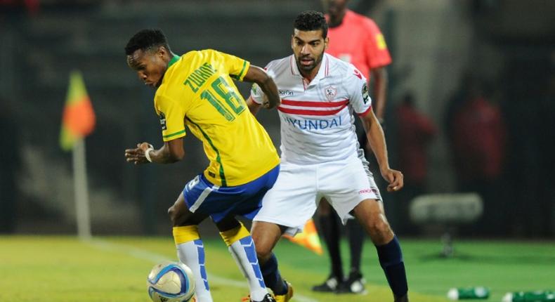 Themba Zwane (L) scored twice to earn Mamelodi Sundowns of South Africa a 2-1 victory over Wydad Casablanca of Morocco Saturday in a CAF Champions League Group A match near Pretoria.