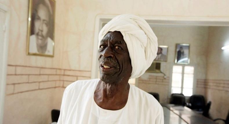 Member of the Sudanese Communist Party's central committee, Siddig Yousif poses at the party's office on May 7, 2014 in the capital Khartoum