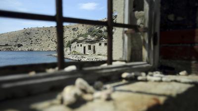A view of damaged prison buildings on the Goli Otok (Barren Island)