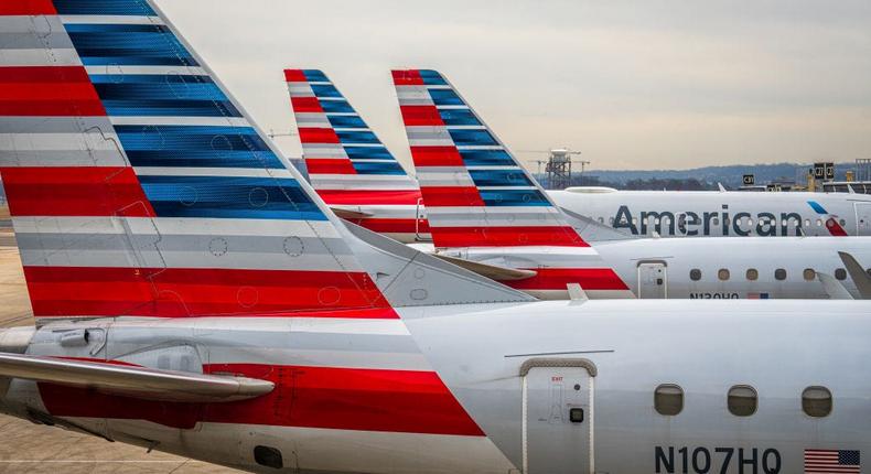 Some couples are vying over who gets to pay for household expenses in order to rack up points for loyalty programs such as American Airlines' AAdvantage.J. David Ake/Getty Images
