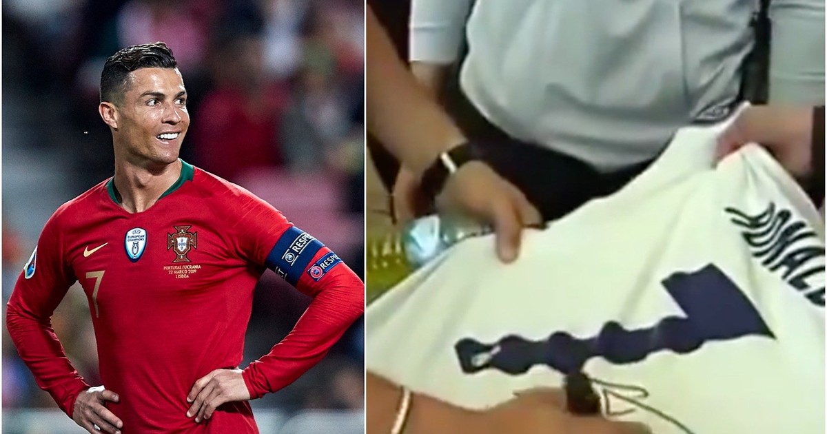 Cristiano Ronaldo signed a Real Madrid jersey for a young fan, but told