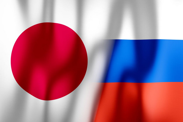 Flagi Japonii i Rosji