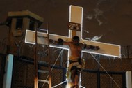 An inmate depicting Jesus performs the crucifixion scene in the theatre play Jesus Christ Superstar