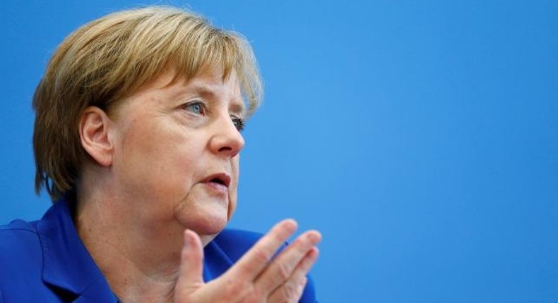 Merkel says believes she acted responsibly after attacks