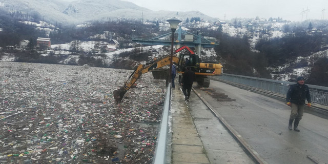 Trash will be driven into the banks by boats and will be removed by bulldozers.