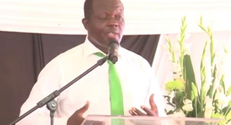 Raphael Tuju speaking in Rarieda during the burial of his brother Kefa Tuju