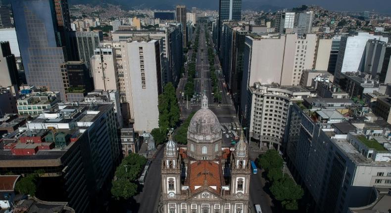 Aerial view of the Candelaria church and the empty Presidente Vargas avenue in downtown Rio de Janeiro, Brazil on March 25, 2020, during the outbreak of the new coronavirus