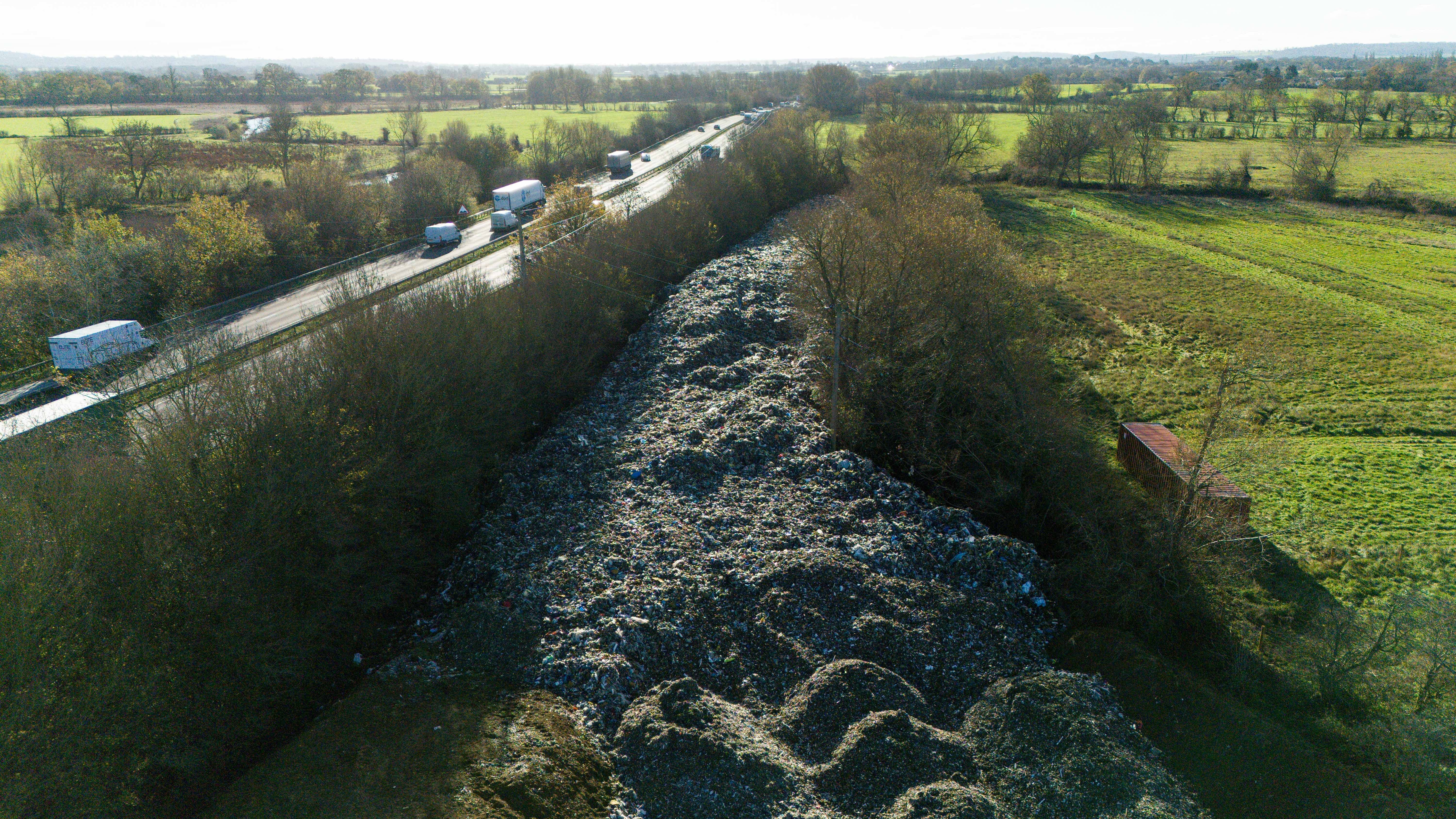 Man arrested over 150-metre waste mountain threatening River Cherwell
